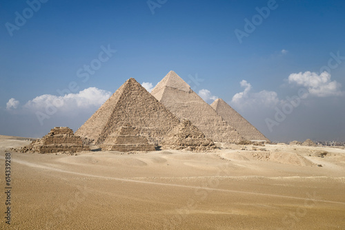 Panoramic view of pyramids from the Giza Plateau (three pyramids known as Queens' Pyramids on front side; next in order from left: the Pyramid of Menkaure, Khafre and Chufu, Cairo, Egypt