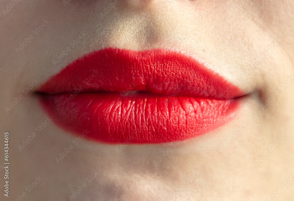 Close up of woman's lips with red lipstick, isolated on white Close up of woman's lips with red lipstick, isolated on white