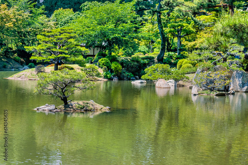 Small island in middle of lake in Shukkeien Gardens in Hiroshima.