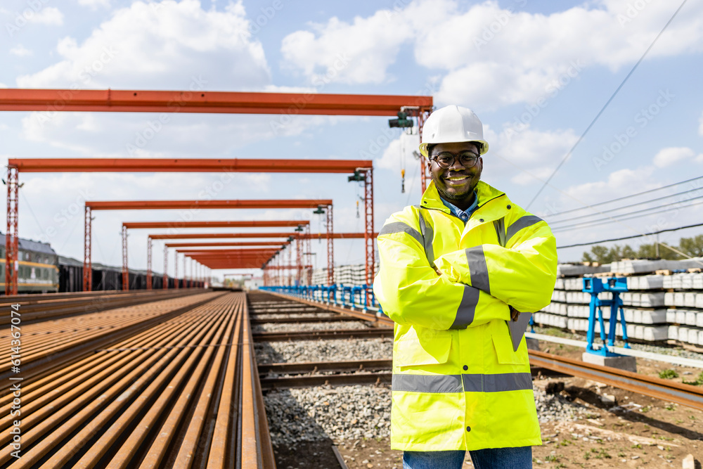 Fototapeta premium Portrait of railroad construction site supervisor looking to the camera.