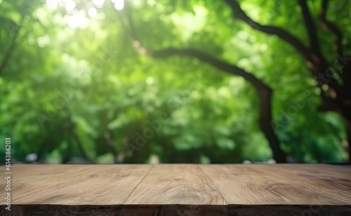 Tabletop with open space. Empty wooden table on abstract blur natural green forest background