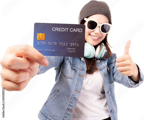 Happy young hipster woman showing credit card with thumbs up looking at camera with happy over isolated on white background Customer girl get satisfied of credit card service Smile teenager girl photo