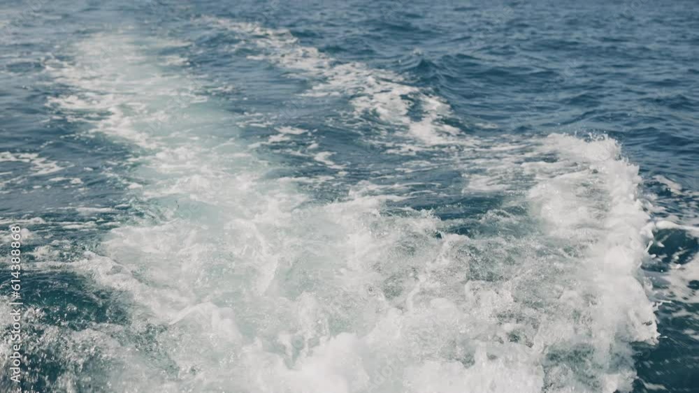 Slow motion of boat trail on a sea surface Slow motion of boat trail on a sea surface