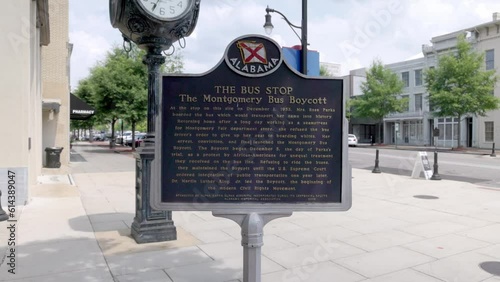 Rosa Parks Bus Stop location historical marker in downtown Montgomery, Alabama with gimbal video walking forward. photo