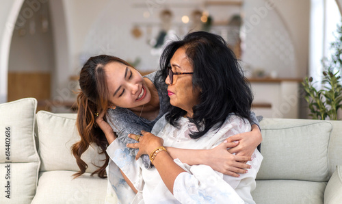 Portrait of enjoy happy love asian family senior mature mother and young daughter smiling play laughing and having fun together at home, care, elderly, insurance.happy family and Mother Day concept