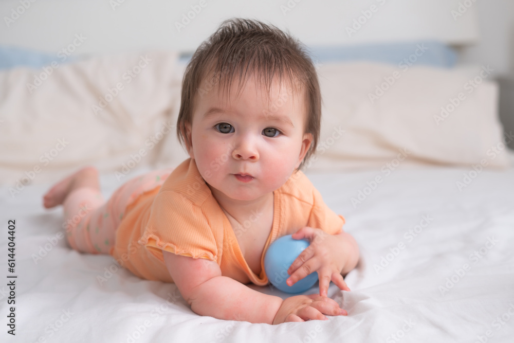 lifestyle home portrait of happy and beautiful 8 months old baby lifestyle home portrait of happy and beautiful 8 months old baby