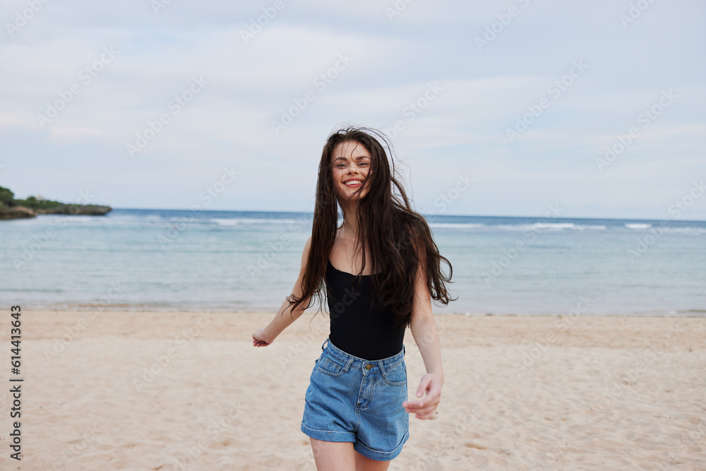 smile woman running sea ocean sunset travel beach young lifestyle summer smile woman running sea ocean sunset travel beach young lifestyle summer