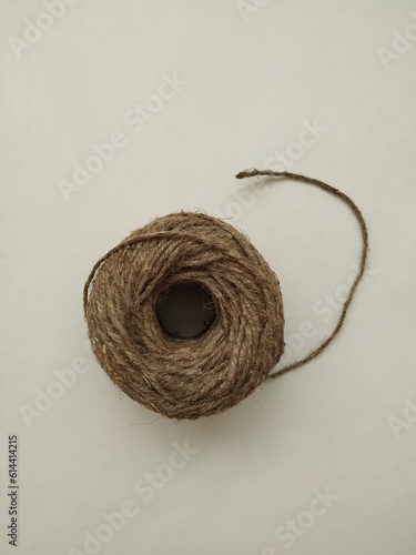 skein of twine on white background 