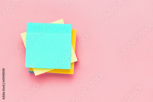 Sticky paper notes on pink ...