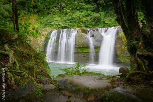 Its large cliffs are popular for jumping  and there is a safe swimming pool. Lingjiao Waterfall is located in Pingxi District  New Taipei City