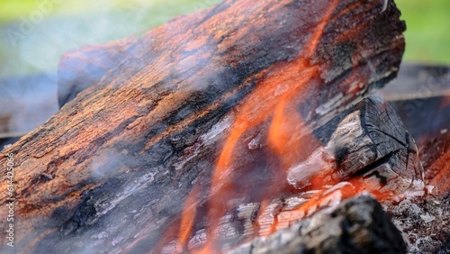 Fiery Intensity: Front View Closeup of Blazing log fire Against a Dark Background, fire footage 