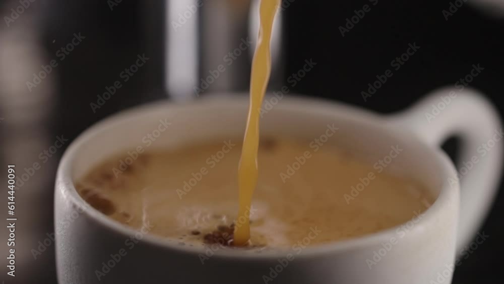 Slow motion pour full cup of coffee from coffee machine Slow motion pour full cup of coffee from coffee machine