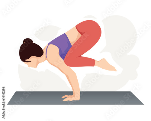 Woman practicing yoga doing bakasana, crane pose.