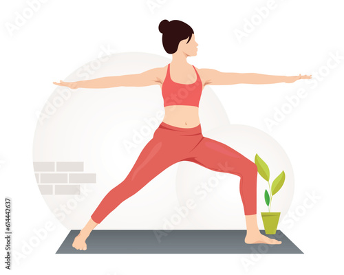 Young woman practicing Virabhadrasana, Warrior Pose yoga exercise.