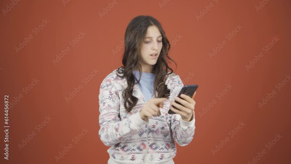 The young woman who can't use the app on the phone. The young woman who can't use the app on the phone.