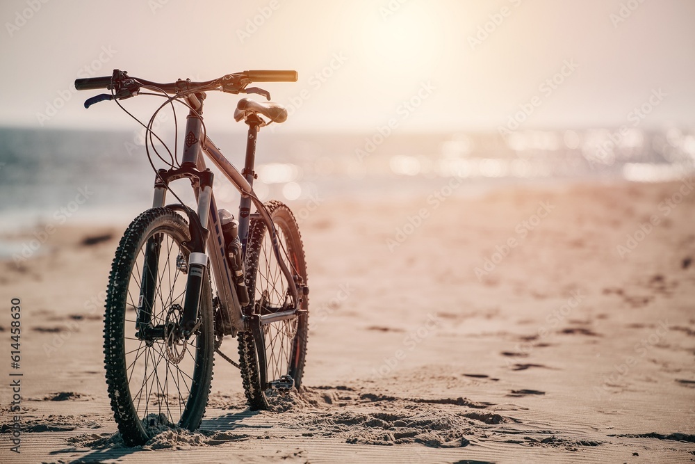 Fototapeta premium 13.05.2023 Baltic Sea, Europe, Poland. Bike on the seashore sandy beach. Fitness sports motivation and inspiration. MTB on the seaside
