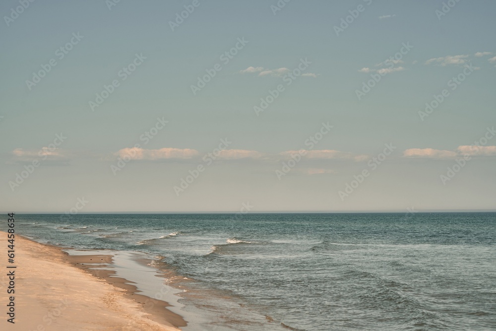 Serene Morning Bliss: Tranquil Baltic Sea Shore Awaits, Embracing the Essence of Vacation