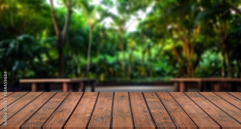 Wooden table and blurred background of the garden with trees. High quality photo