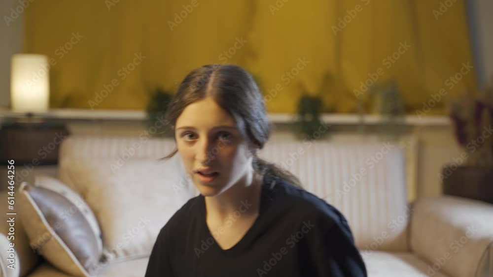 The young woman who runs away as if someone is coming at her.