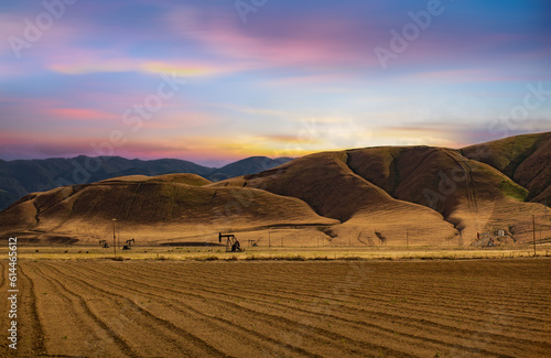Side View on Country Road with mountain at sunset in California, USA © CK