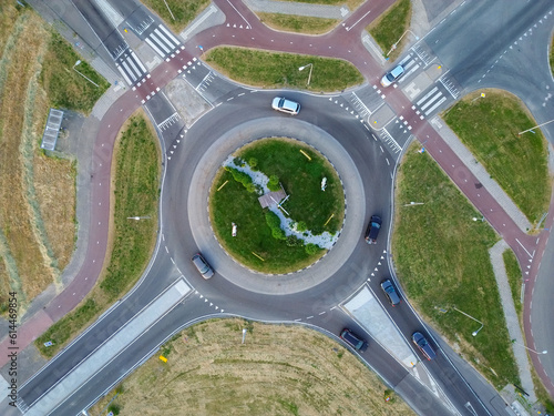 Aerial view of cars on a roundabout or traffic circle photo