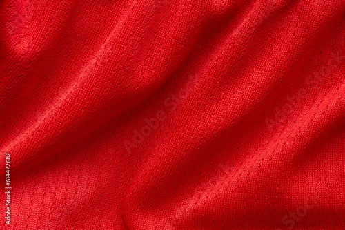 Red sports clothing fabric football shirt jersey texture background © Kwangmoozaa