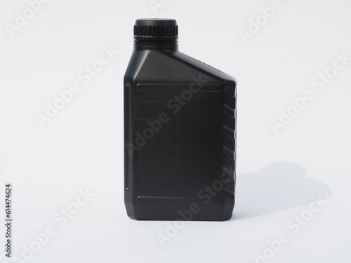 Engine oil can isolated on white background. Four-stroke engine oil. Effects of engine oil on fuel economy photo