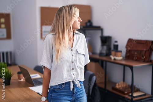 Young blonde woman business worker standing at office