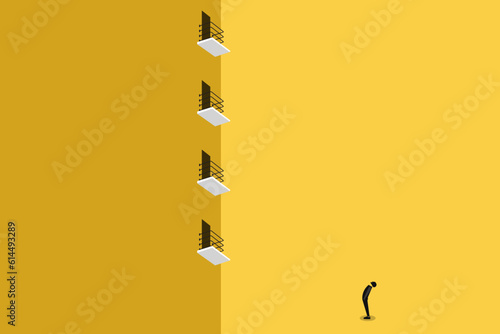 Businessman look up the levels of balcony. concept of success , journey, opportunity, and achieve goal