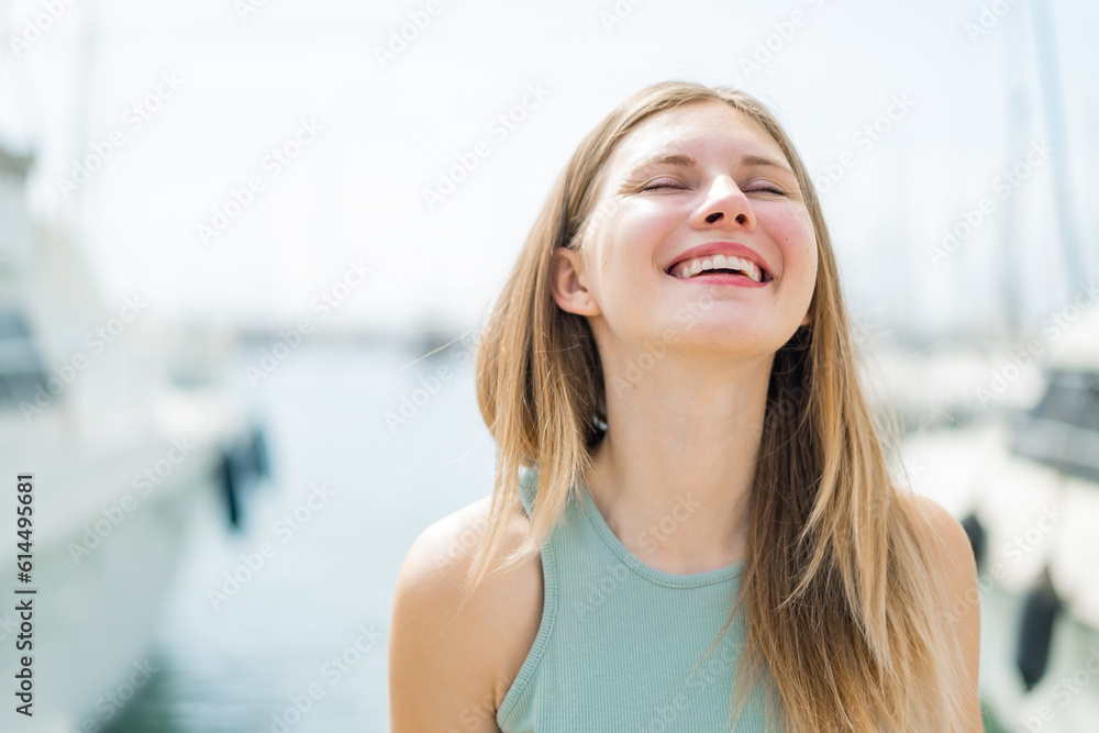 Young blonde woman at outdoors . Portrait Young blonde woman at outdoors . Portrait