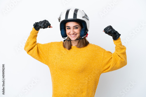 Young caucasian woman with a motorcycle helmet isolated on white background doing strong gesture