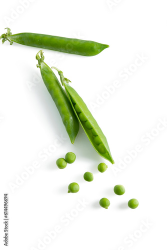 Fresh green vegetable pea pods and beans isolated on white background