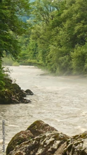 Mountain river flowing in a canyon in springtime