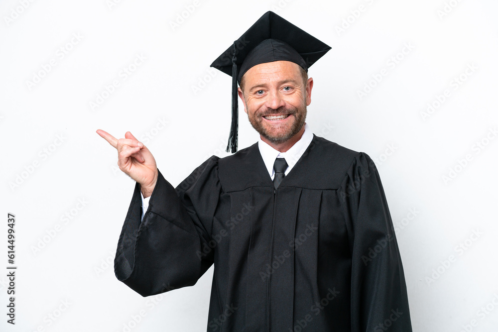 Middle age university graduate man isolated on white background pointing finger to the side Middle age university graduate man isolated on white background pointing finger to the side