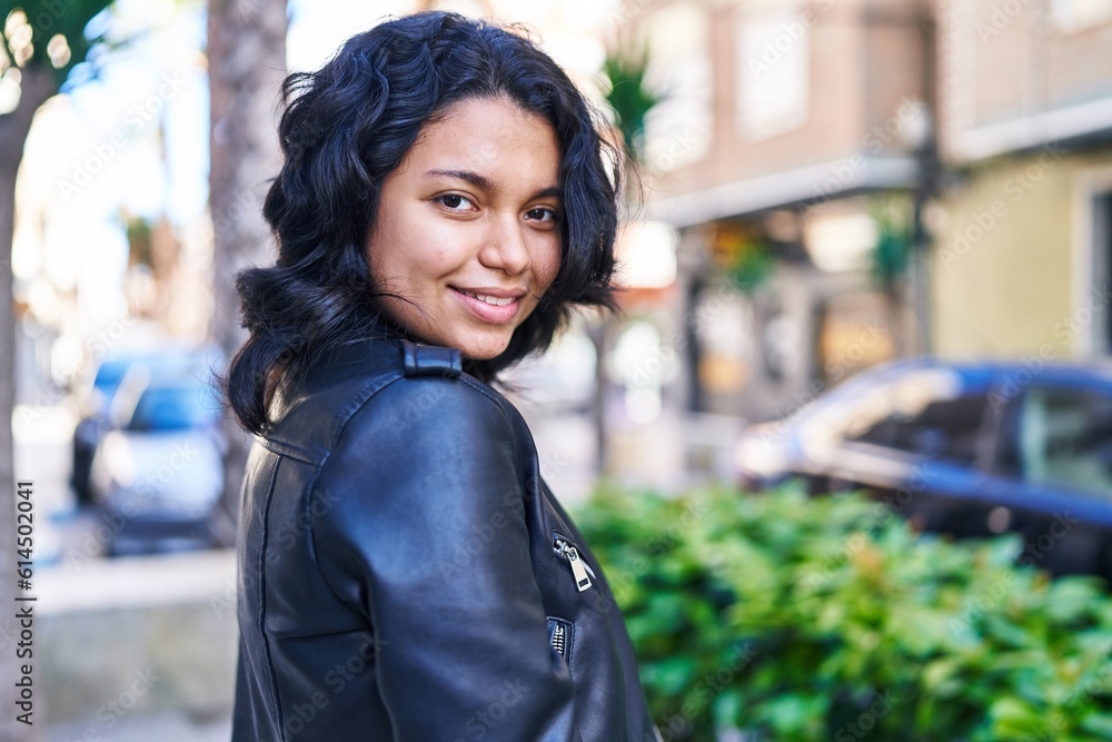 Young latin woman smiling confident standing at street Young latin woman smiling confident standing at street