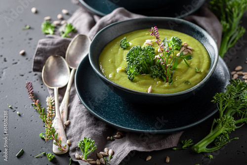 Healthy broccoli soup with cream and sunflower seeds. photo