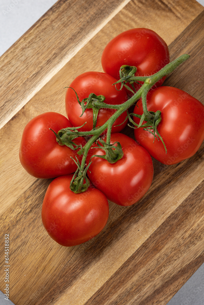 Red tomatoes in the background. Close up Red tomatoes in the background. Close up