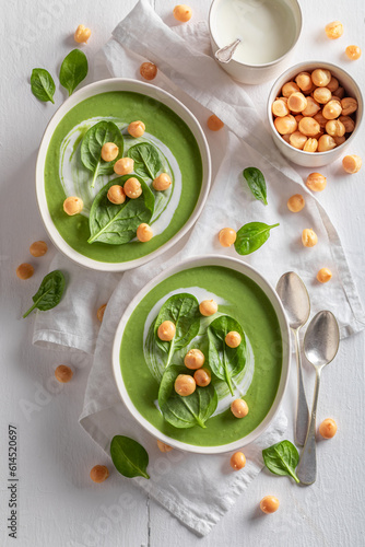Vegan spinach soup served w...