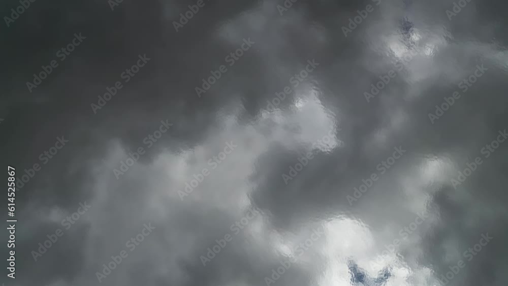 Aerial top view of gray moody sky with clouds reflection in water of lake, abstract background, 4k Aerial top view of gray moody sky with clouds reflection in water of lake, abstract background, 4k