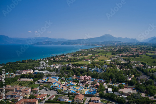 Amusement park, attractions on Lake Garda in Italy, aerial view. Aerial panorama of the popular amusement park on Lake Garda. Sights of Italy.