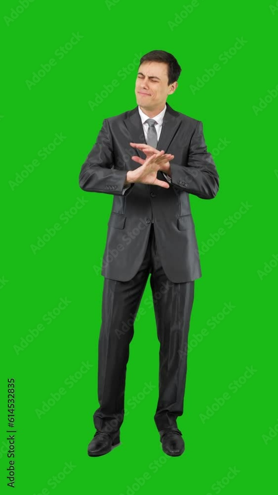 Businessman showing like gesture in studio. Chroma key Businessman showing like gesture in studio. Chroma key
