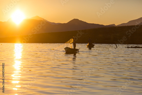 Fisherman on sunrise