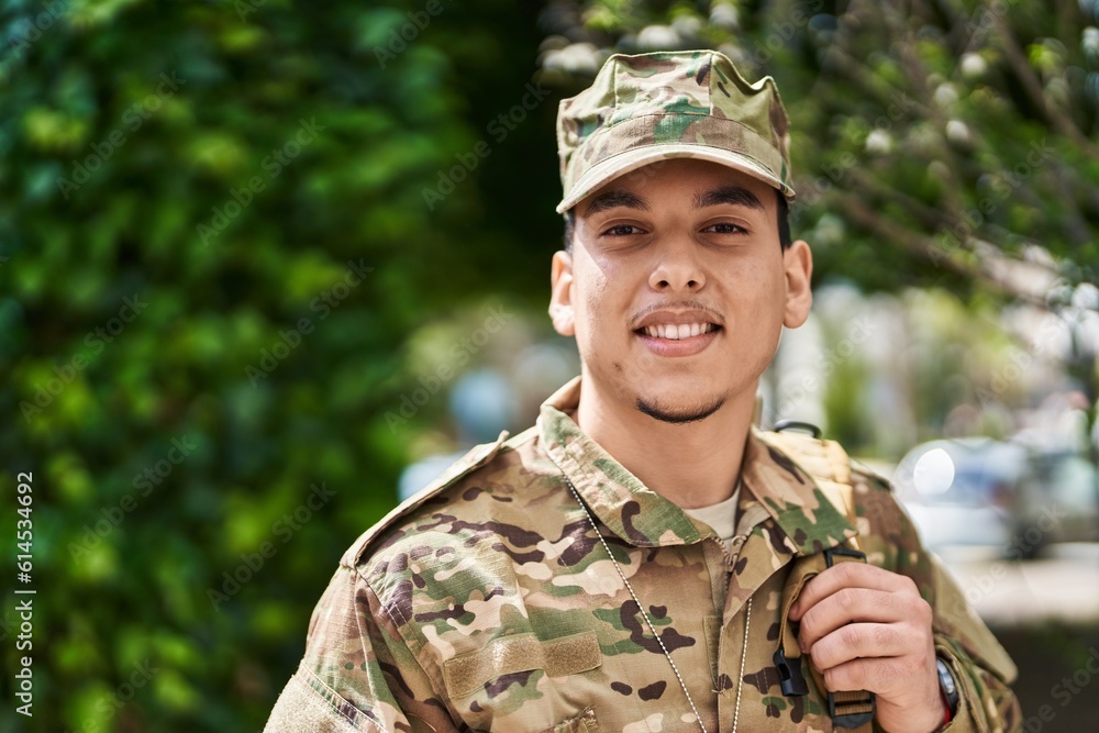 Young man army soldier smiling confident standing at park