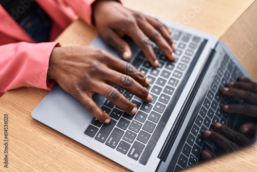 African american woman business worker using laptop working at office