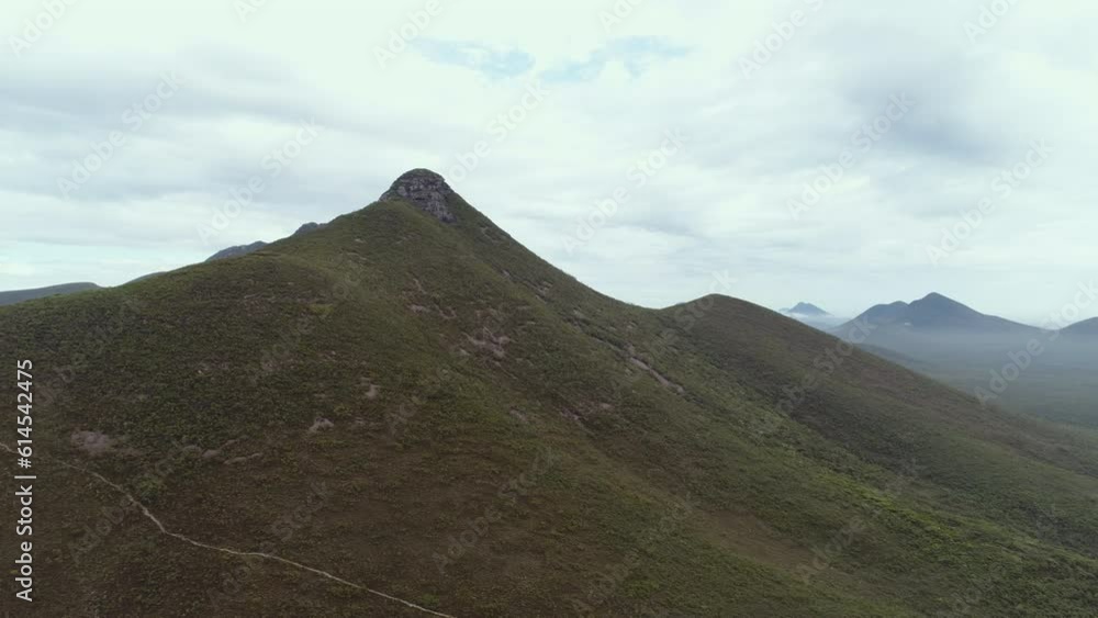 Australian mountain range. Bluff Knoll mountain in Stirling Range National Park. Aerial view from drone 4K. Australian mountain range. Bluff Knoll mountain in Stirling Range National Park. Aerial view from drone 4K.