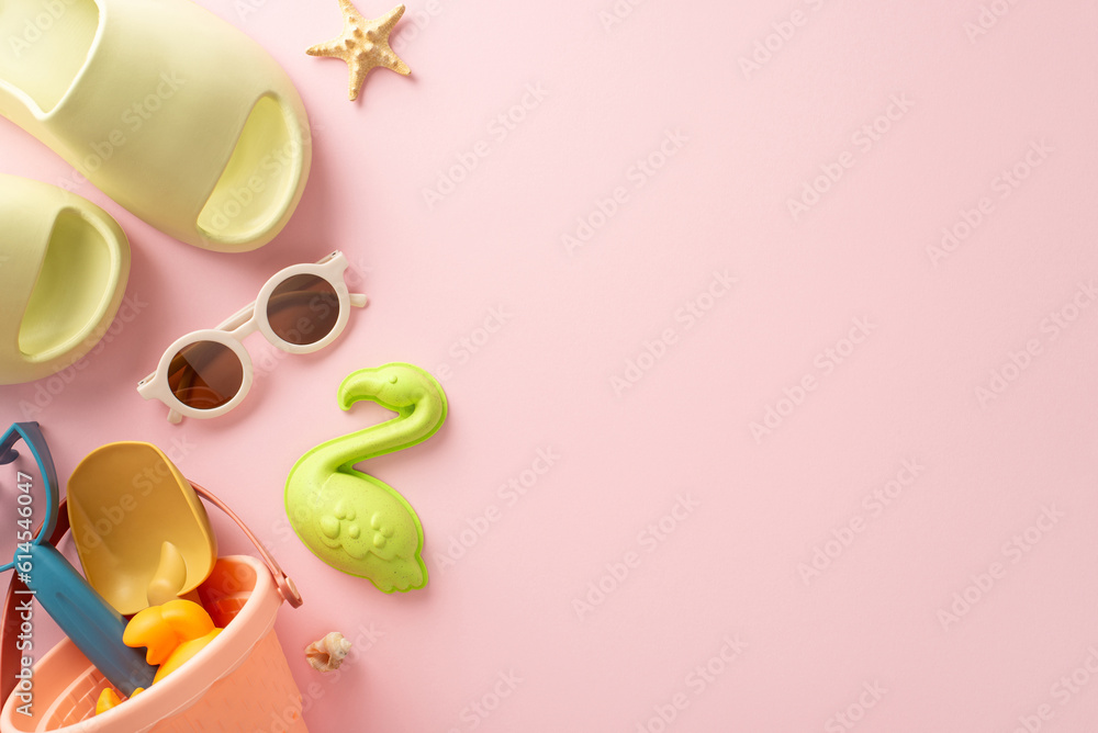 Peaceful summer retreat with children admiring with this top view snapshot, showcasing marine shells, beach toys, flip-flops and sunglasses on pink backdrop with empty space for text or advert