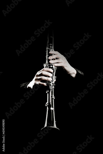 Clarinet player. Clarinetist hands playing woodwind isolated photo