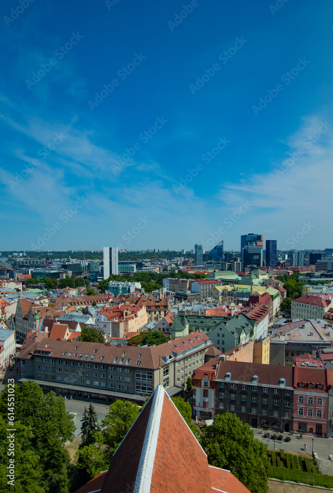 Aerial view of Tallinn Center, Estonia, with copy space during sunny summer day: Old town and modern city skcrapers contrast