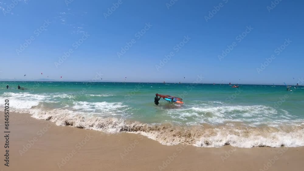 Kitesurfing on Valdevaqueros beach, Gibraltar Strait, Spain Kitesurfing on Valdevaqueros beach, Gibraltar Strait, Spain