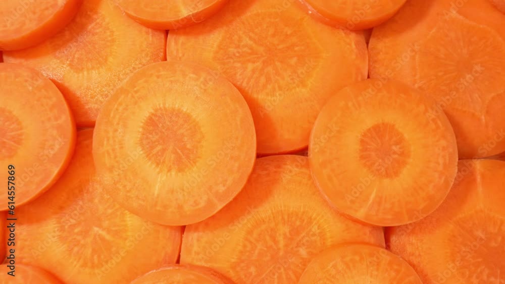 Explores the edge of the carrot slice, providing a closer look at its cross-section. The macro lens unveils the concentric rings formed by the carrot's growth, showcasing its natural beauty. 4K HDR
Explores the edge of the carrot slice, providing a closer look at its cross-section. The macro lens unveils the concentric rings formed by the carrot's growth, showcasing its natural beauty. 4K HDR
